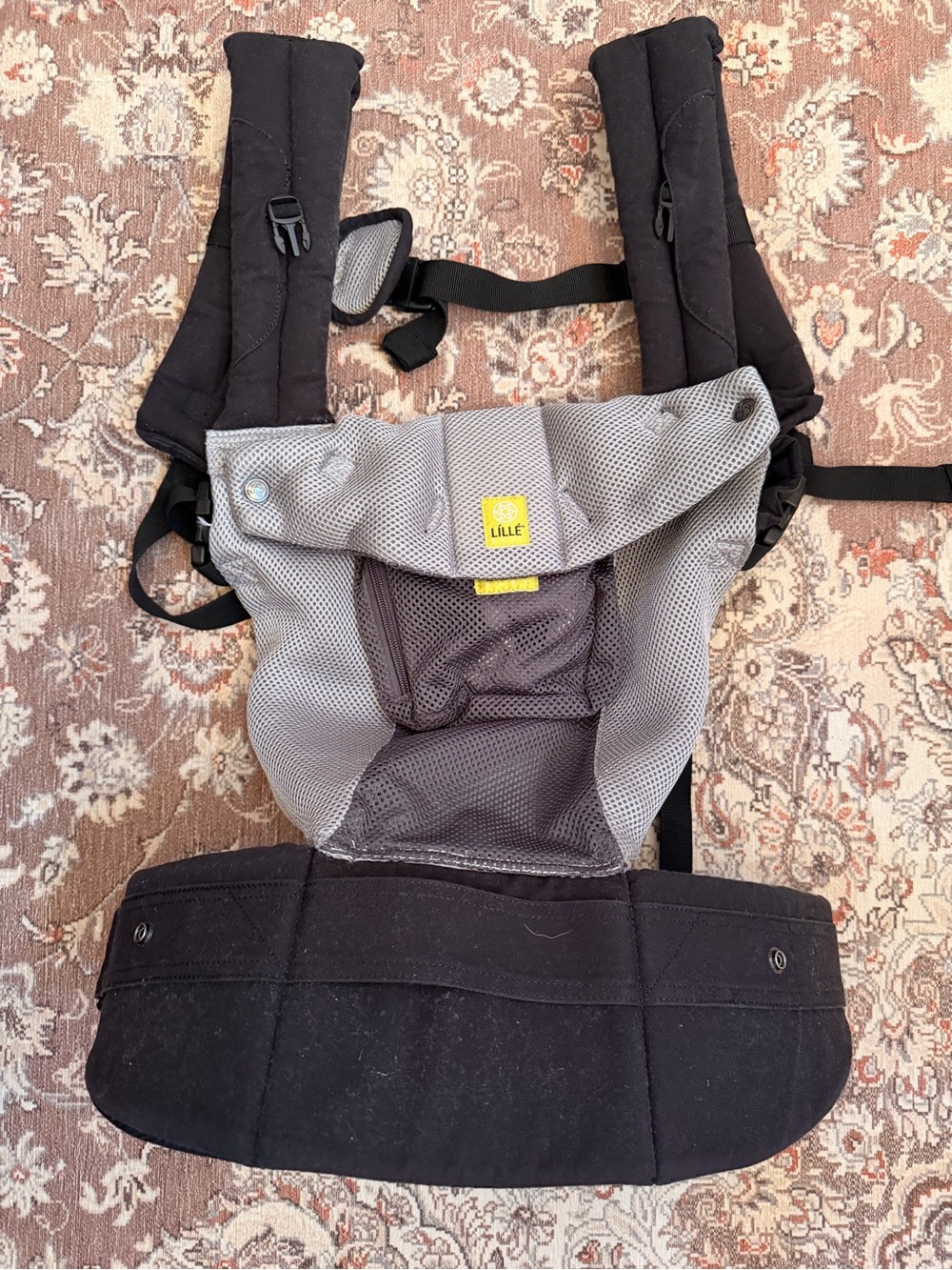Lille newborn to toddler carrying device